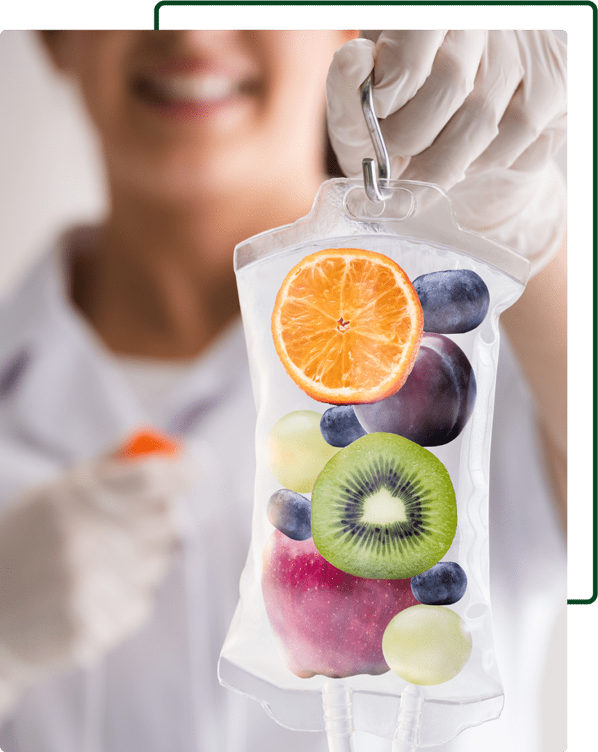 A person holding up a bag of fruit